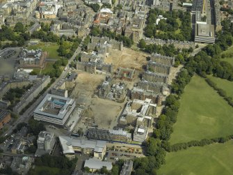 Aerial view of the old Edinburgh Royal Infirmary site during redevelopment with the dental institute adjacent, taken from the WSW.