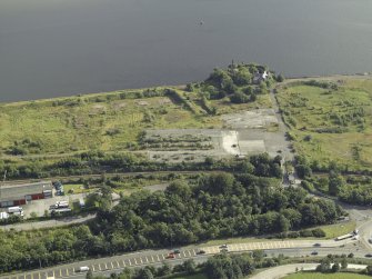 Oblique aerial view of the remains of the shipyard centred on the castle, taken from the N.
