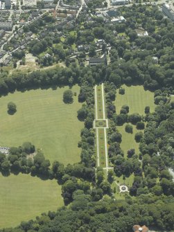 Oblique aerial view centred on the cathedral, burial ground and park, taken from the NNE.