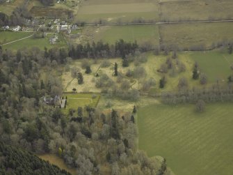 General oblique aerial view centred on the tower-house, taken from the SW.