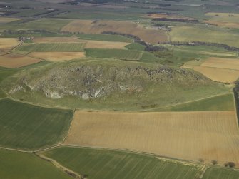 Oblique aerial view centred on the remains of the fort, taken from the SE.