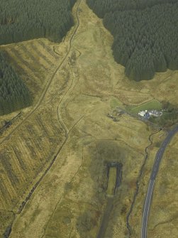 Oblique aerial view centred on S end of Whitrope railway tunnel  and Whitrope Cottages, taken from the SW.