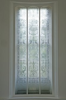Interior. First floor, detail of etched glass in window to stairwell