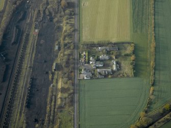General oblique aerial view centred on the house and hospital buildings, taken from the E.