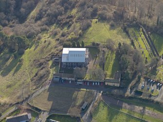 Oblique aerial view centred on the chapel, taken from the N.