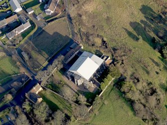 Oblique aerial view centred on the chapel, taken from the SW.