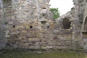 Chapter-house, E end, S wall, view of lower level from N