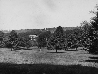 Distant view labelled 'Holiday July 1908. Ballechan house - Strathtay'

PHOTOGRAPH ALBUM NO 62: THE BANFF ALBUM
Album of amateur snapshots bound in bottle green cloth with gilt inscription
Insc: (front cover) 'Photographs', no personal inscription, compiler unknown.
Buildings and topography of Perthshire, Banffshire and Eigg, taken on three holiday tours in 1908, 1909 and 1913. Many views are dated and accompanied by short inscriptions.