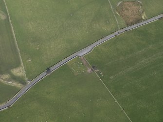 Oblique aerial view centred on Torhousekie stone circle, taken from the WSW.