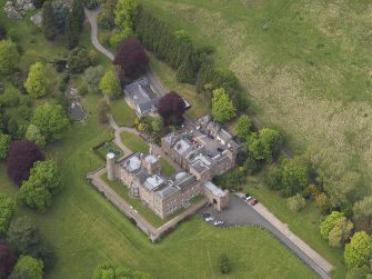 Oblique aerial view centred on the country house, taken from the SSE.