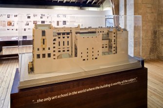 View of building model within exhibition, in basement area of school.