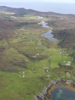 General oblique aerial view of Lower Kilchattan and Upper Kilchattan looking towards Loch Fada, taken from the SW.