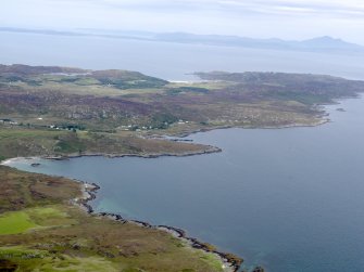 General oblique aerial view of N Colonsay, looking towards Loch Staosnaig, Port an Obain, Kiloran Bay and Mull, taken from the SE.
