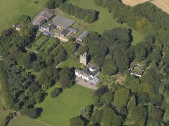 General oblique aerial view of the Affleck Estate, centred on the castle, taken from the SSE.