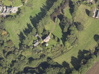 General oblique aerial view of Farnell Village, centred on Farnell Castle, taken from the SW.