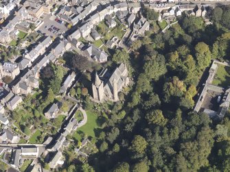 General oblique aerial view of the Skinner's Burn area of Brechin, centred on Brechin Cathedral, taken from the SW.