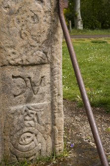 Detail of ogham inscription on right hand side of front face of the Rodney Stone (daylight)