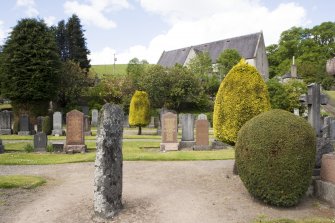 General view showing Pictish cross slab in churchyard