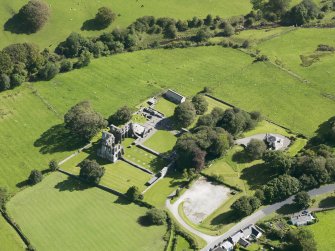 Oblique aerial view of Dundrennan Abbey, taken from the NNW.