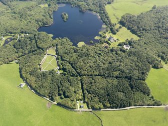 General oblique aerial view of Lochnaw Castle and policies, taken from the SW.
