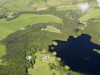 General oblique aerial view of Lochnaw Castle and policies, taken from the SE.