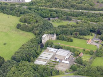 Oblique aerial view of Kinneil House and Duchess Anne Cottages, Bo'ness, taken from the SE.