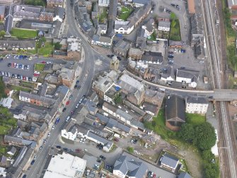 Oblique aerial view of Lockerbie centred on the Town Hall, taken from the SSE.