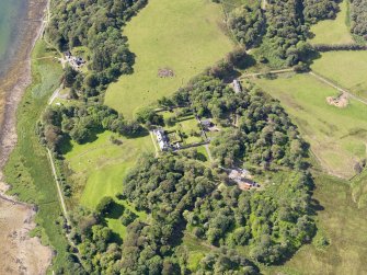 Oblique aerial view of Ardpatrick House and policies, taken from the NE.