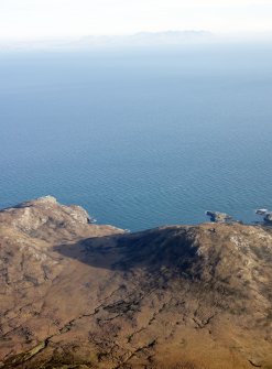 General oblique aerial view through Gleann Mile-feala towards Ushenish lighthouse, S Uist, taken from the W.