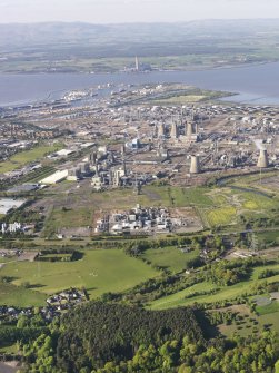 General oblique aerial view of Grangemouth Oil Refinery with Longannet Power station beyond, taken from the SSW.