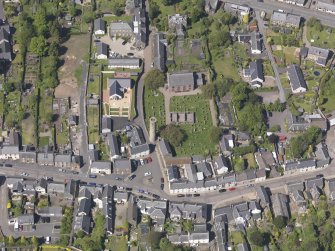 General oblique aerial view of Abernethy centred on the Kirk of St Bride, taken from the SSE.