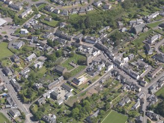 General oblique aerial view of Abernethy centred on the Kirk of St Bride, taken from the W.
