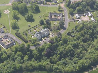 Oblique aerial view of Ballumbie Castle, taken from the N.