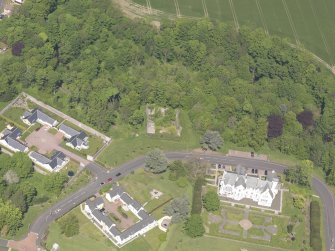 Oblique aerial view of Ballumbie Castle, taken from the SSE.