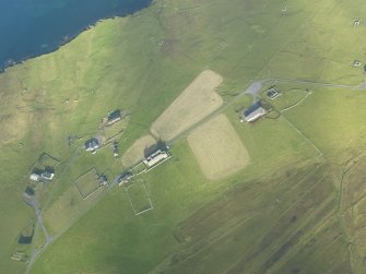 General oblique aerial view of Muness Castle, Unst, looking NE.
