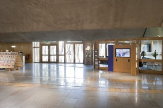 View looking east across the main hall of the Scottish Parliament, towards the reception area and glazed east wall