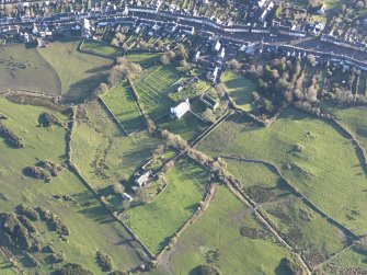 Oblique aerial view centred on Whithorn parish church, looking ESE.