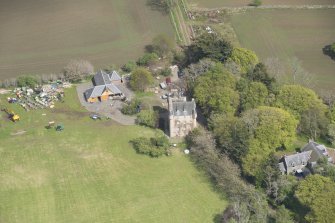 Oblique aerial view of Tillycairn House, looking to the ENE.