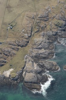 Oblique aerial view of Vaul, Dun Beag, Tiree, looking WSW.