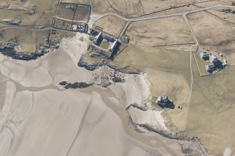 Oblique aerial view of Breachacha, Coll, looking W.