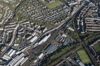 Oblique aerial view of the Edinburgh Tramway, Haymarket Motive Power Depot and Dalry, looking to the SE.