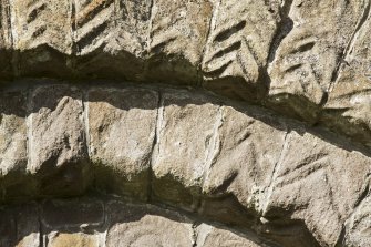 Exterior. South doorway. Detail of archway section.