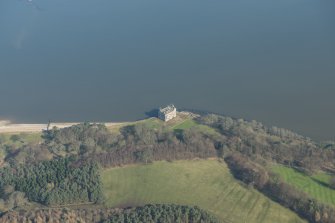 Oblique aerial view of Barnbougle Castle, looking to the NE.