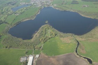 Oblique aerial view of Lochmaben Castle, looking NNW.