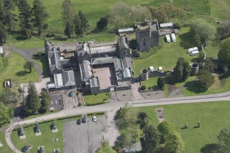 Oblique aerial view of Hoddom Castle, looking ENE.