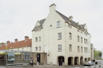 General view of front elevation of 1-12 White Horse Close, 29 Canongate, Edinburgh, from SW.