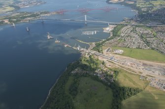 Oblique aerial view of the construction of the Queensferry Crossing and Port Edgar, looking E.