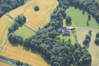 Oblique aerial view of Pitcaple Castle, laundry and walled garden, looking SSE.