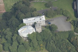 Oblique aerial view of Mearns Castle, looking NE.