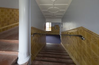 Level 3, gold tiled staircase, view from south